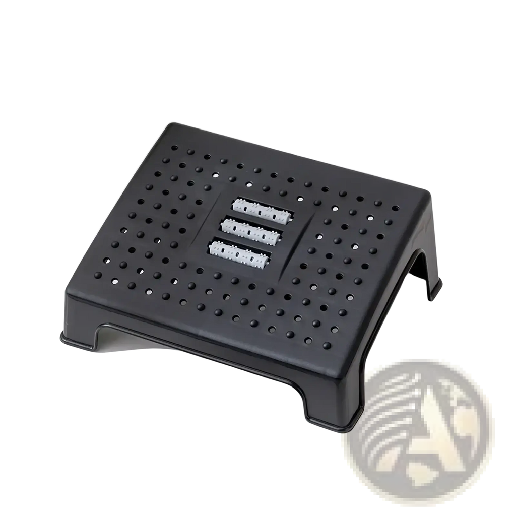 Black plastic ergonomic under desk foot rest with massage rollers and three usb ports on perforated surface