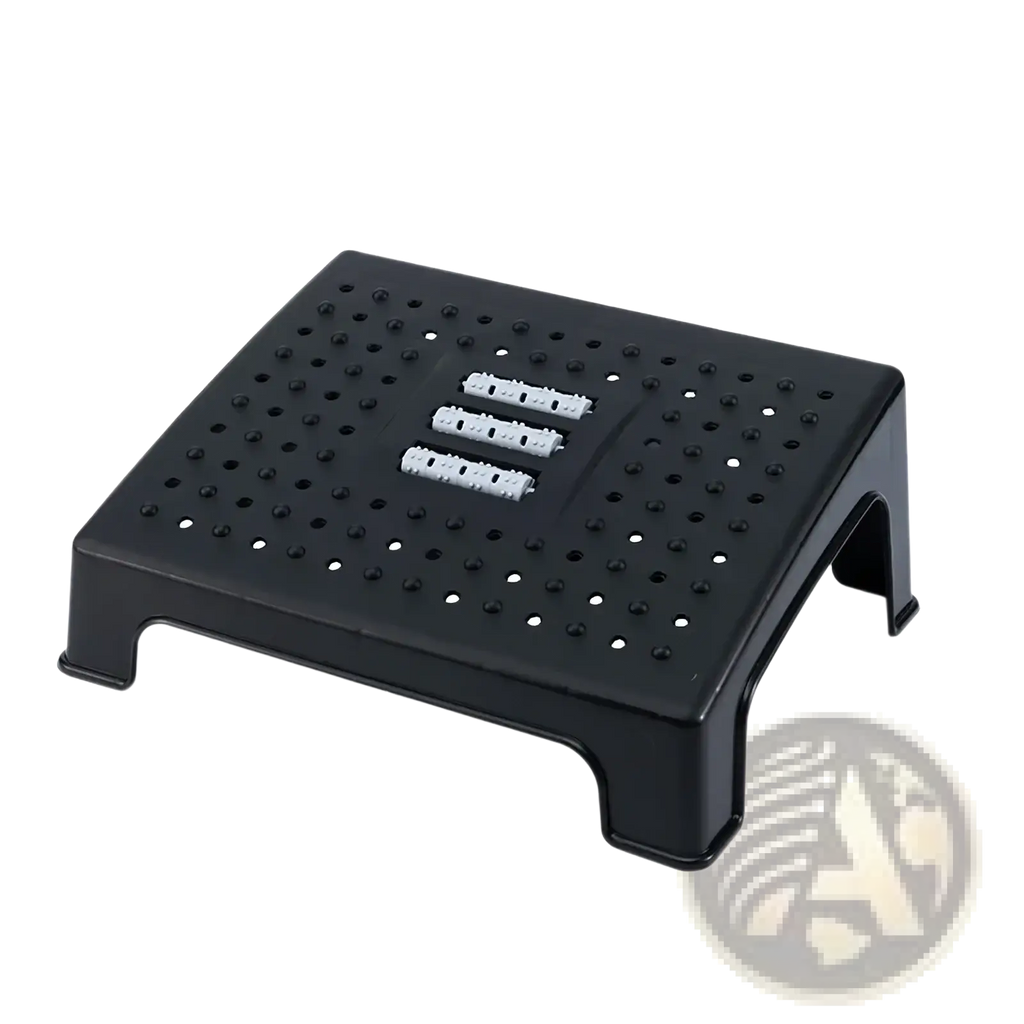 Ergonomic under desk foot rest made of black plastic with perforated surface and three white textured grip strips