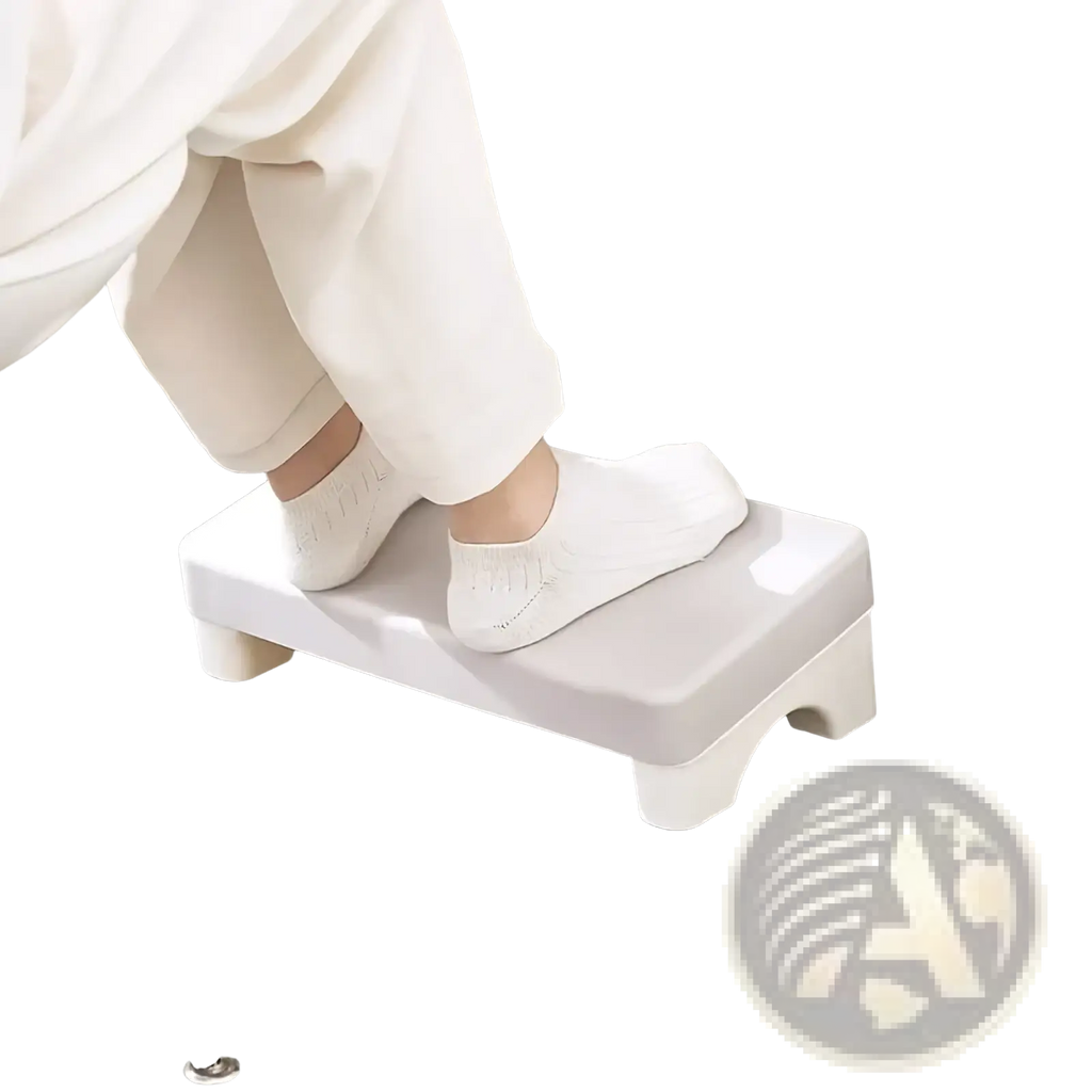 Ergonomic under desk white plastic footrest with rounded edges and four short legs for comfortable support