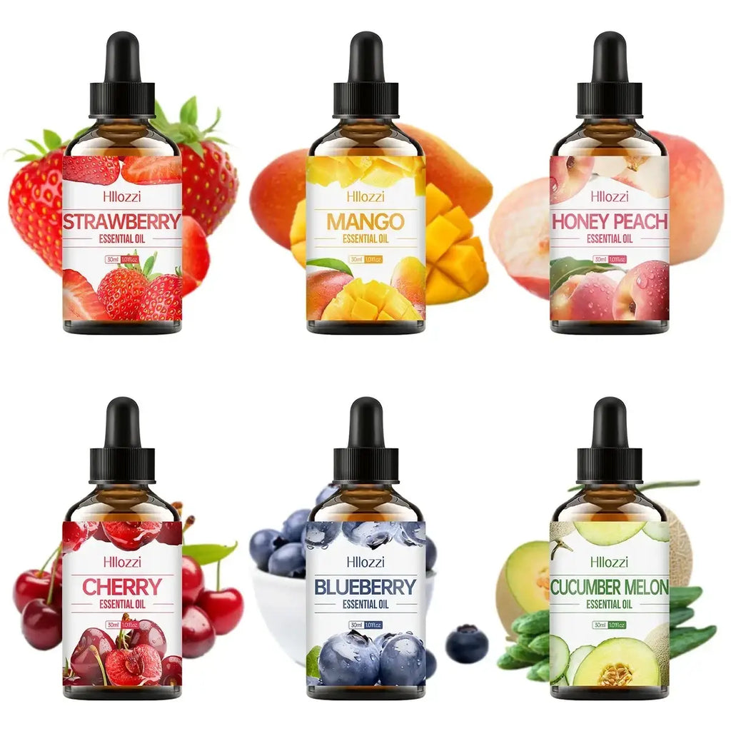 Five amber glass essential oil bottles with black droppers labeled hillozzi fruit set for skin care use