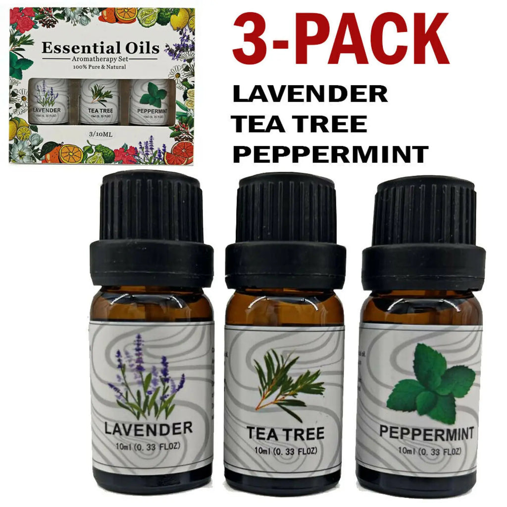 Set of three amber glass essential oil bottles with black caps labeled lavender tea tree and peppermint for aromatherapy