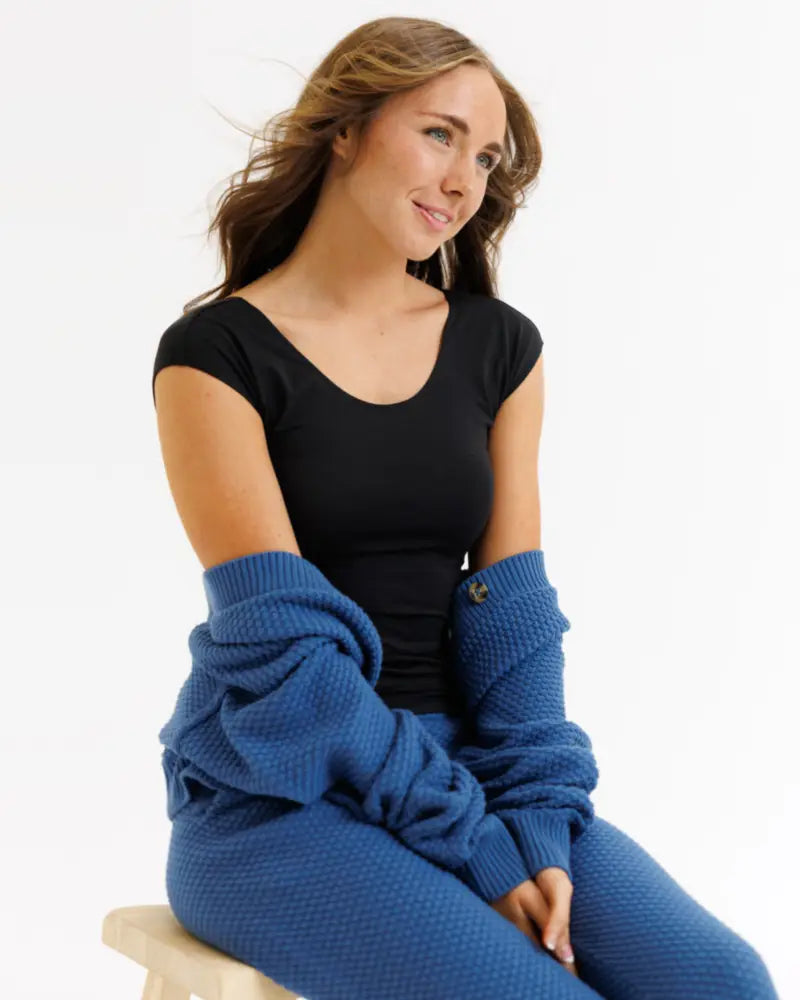 Blue textured knit sweater set with short sleeves and matching pants featuring a tri-blend scoop neck fitted tee