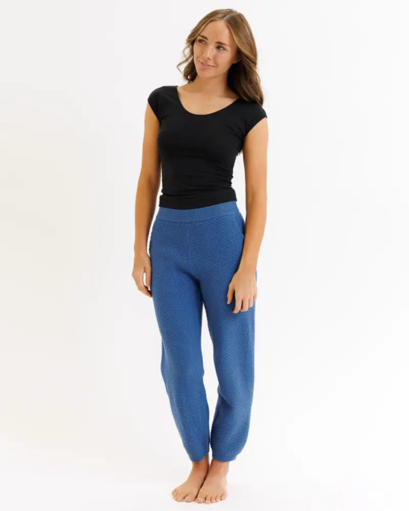 Blue knit tri-blend joggers with a relaxed fit and tapered legs paired with an essential scoop neck fitted tee