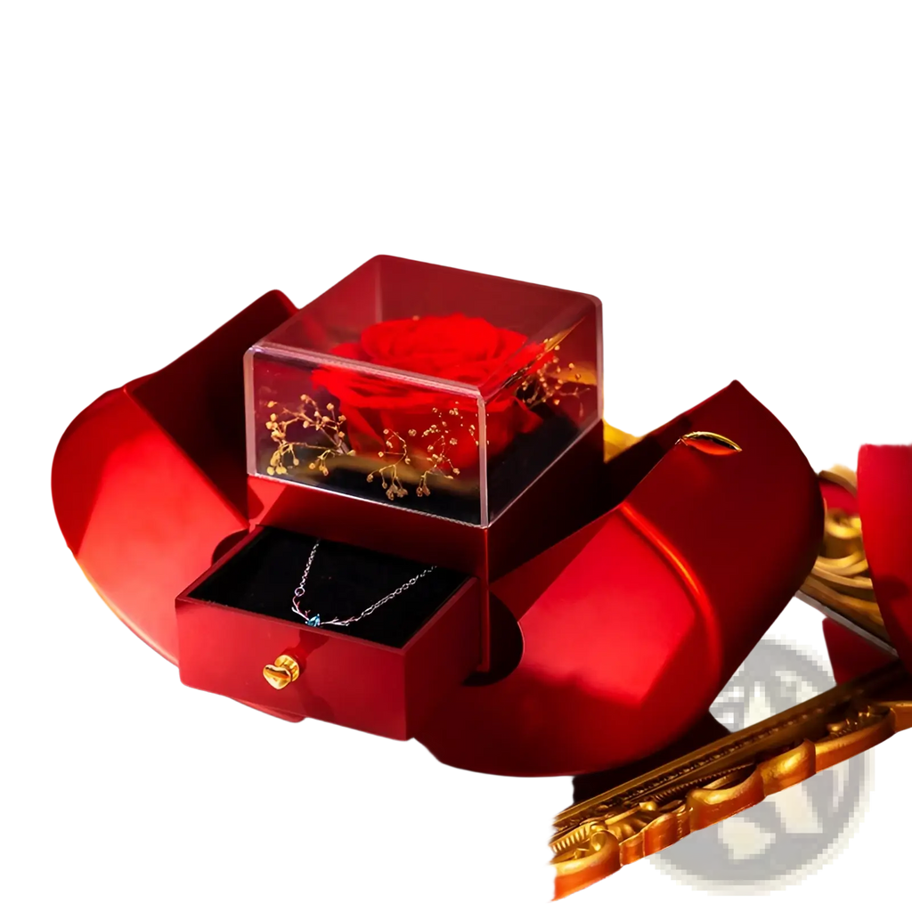 Eternal Rose Apple Jewelry Box with vibrant red preserved rose in clear acrylic case on red velvet drawer with gold hardware