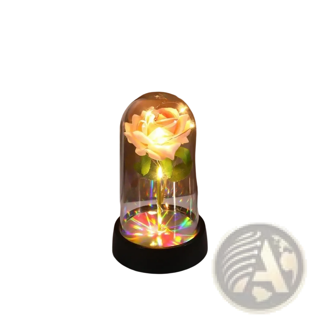 A glowing peach-colored eternal rose in a clear glass dome with a black base and colorful led illumination