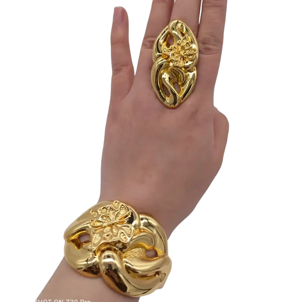 Gold-toned ornate bracelet and matching ring with intricate floral designs in ethiopian arabic color bangles hand luxury jewelry