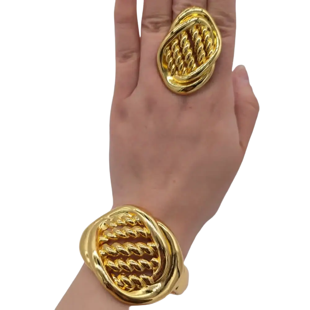 Gold-toned twisted rope-patterned ring and bracelet set showcasing ethiopian arabic color bangles in hand luxury jewelry