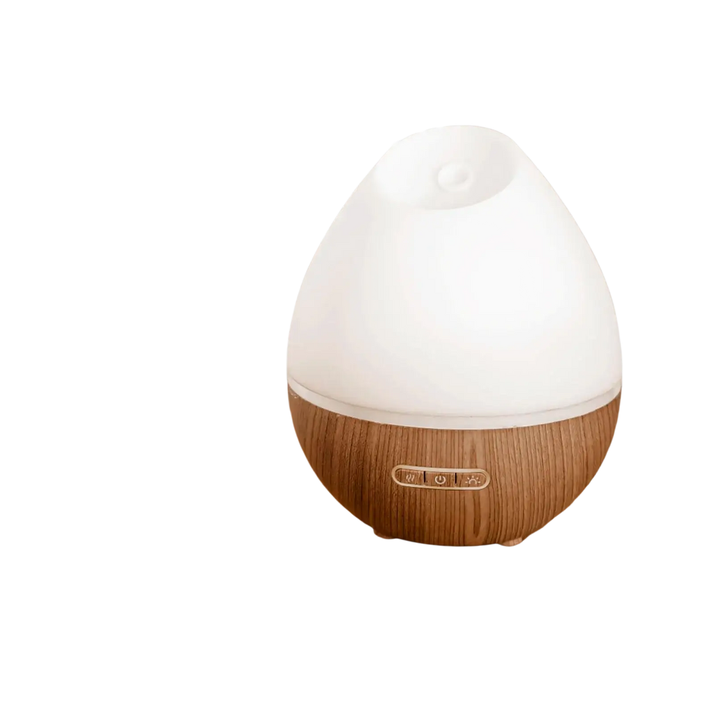 White and wood-grain textured egg-shaped aromatherapy diffuser paired with pure eucalyptus essential oil 10ml bottle