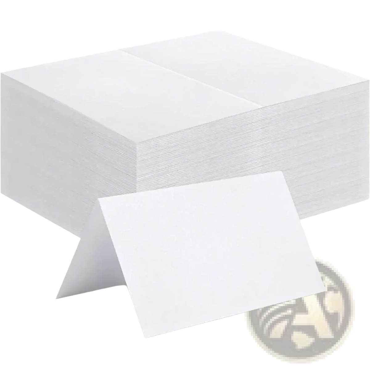 Stack of white folded eucalyptus leaf place cards made of paper for wedding table seating arrangements