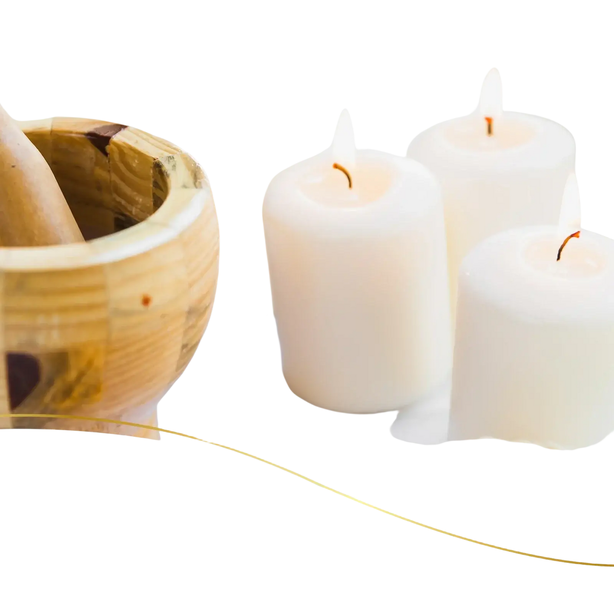 Four white pillar candles with lit wicks in a warm setting for euqee essential oils pure aromatherapy 4 oz product