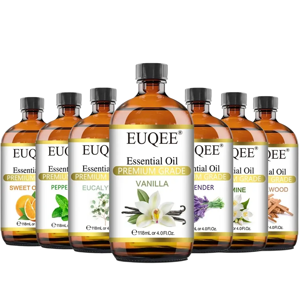 A row of amber glass essential oil bottles with black caps labeled euqee essential featuring botanical illustrations
