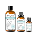 Three amber glass bottles of euqee lavender essential oil with black caps and white lavender labels in 10ml 30ml 100ml sizes