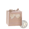 European style wedding gift box candy packaging in blush pink with gold-embossed mountain design and satin ribbon