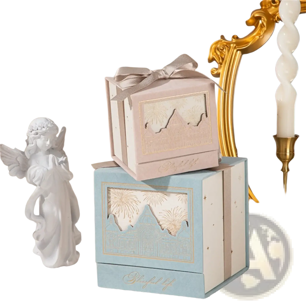 Two elegant square European style wedding gift box candy packaging with pastel pink and blue mountain and fireworks designs