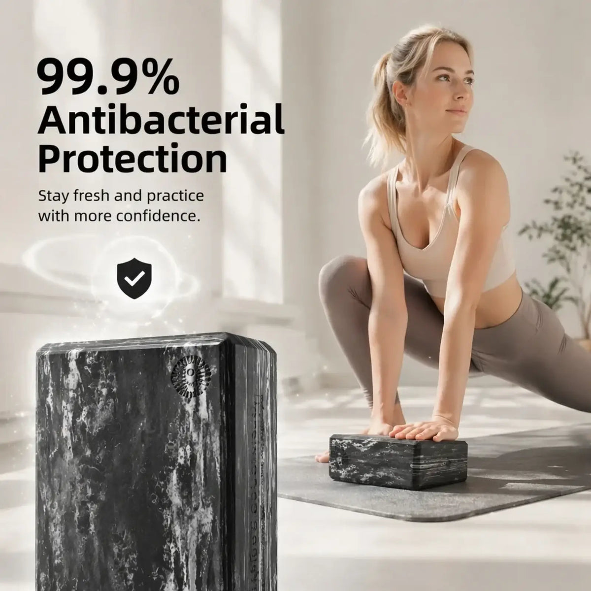 Black marble-textured eva foam yoga block with subtle logo non slip for pilates and exercise support