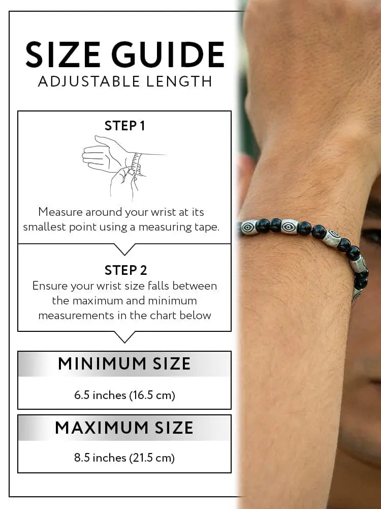 Rtzn black obsidian and silver evil eye protection bracelet with patterned black and silver beads worn on a wrist