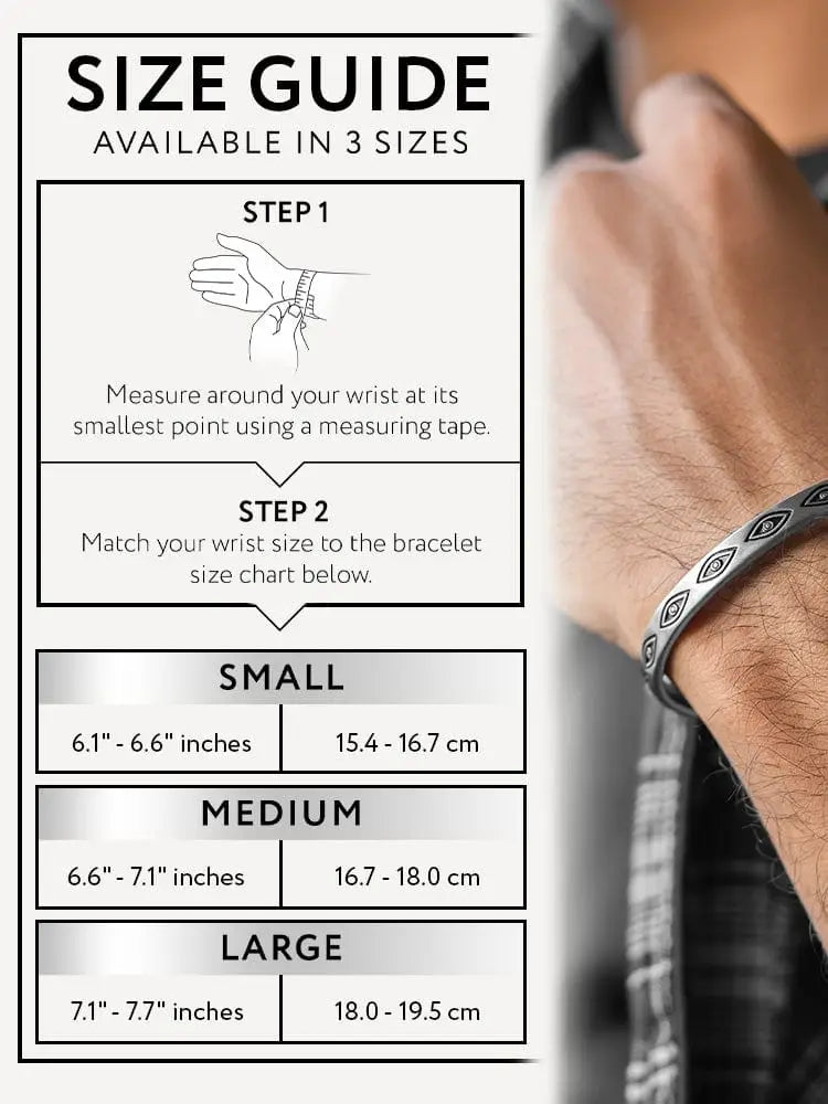 Silver-toned stainless steel cuff bracelet featuring a repeating pattern of black eye motifs in teal geometric design