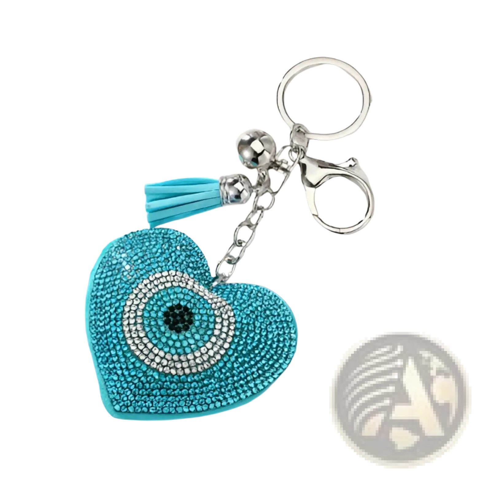 A turquoise leather evil eye heart keychain with blue rhinestones silver chain clasp and tassel accessory