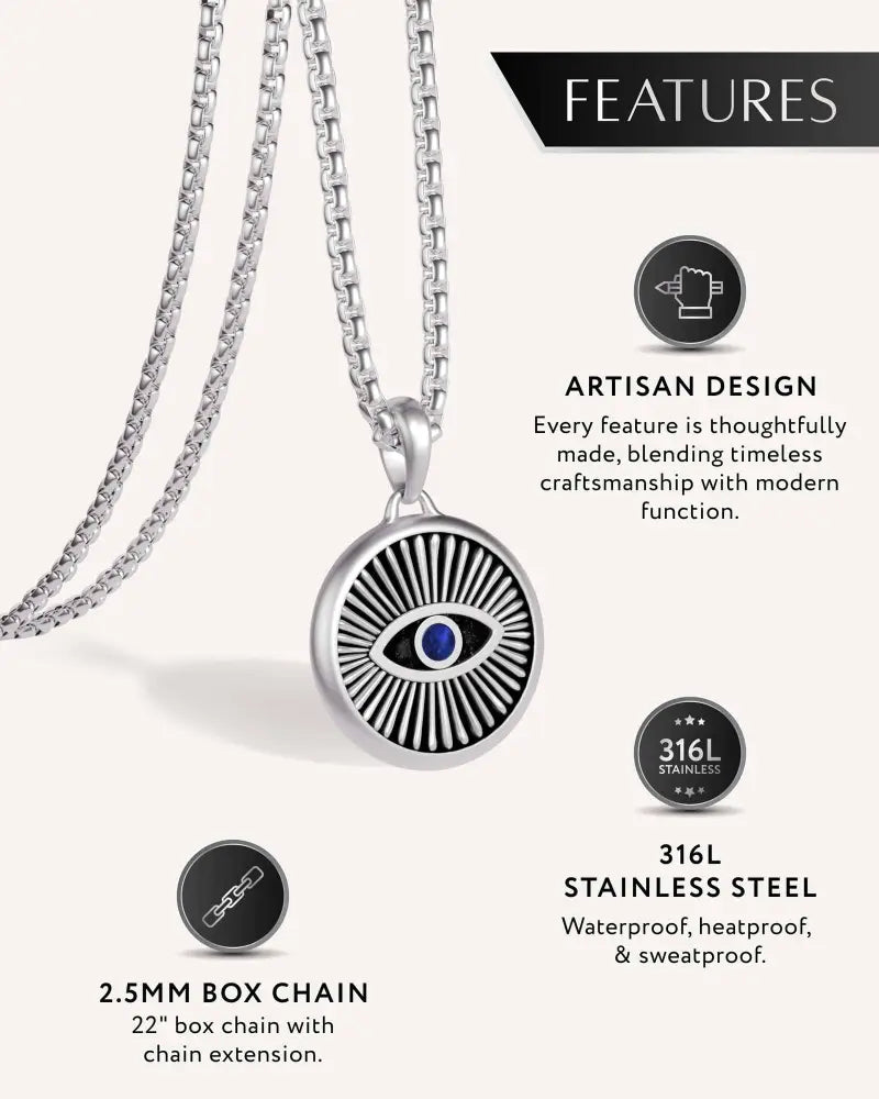 Silver evil eye stainless steel box chain necklace with blue gemstone center and radiating lines on 316L steel