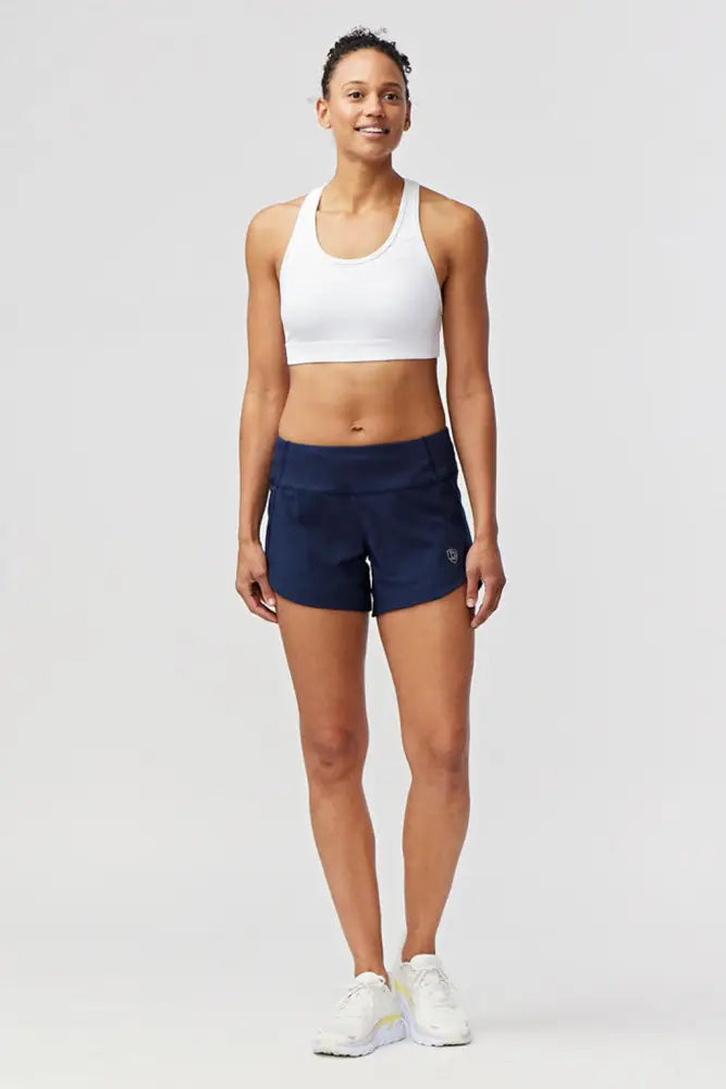 Excel women’s black camouflage athletic workout shorts in navy blue with a subtle logo on the lower left leg
