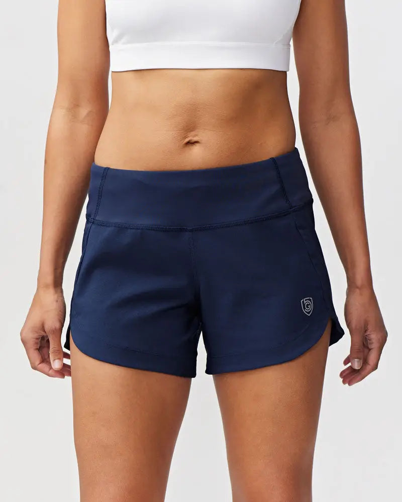 Navy blue high-waisted athletic shorts with a white logo for women designed for workout and active wear