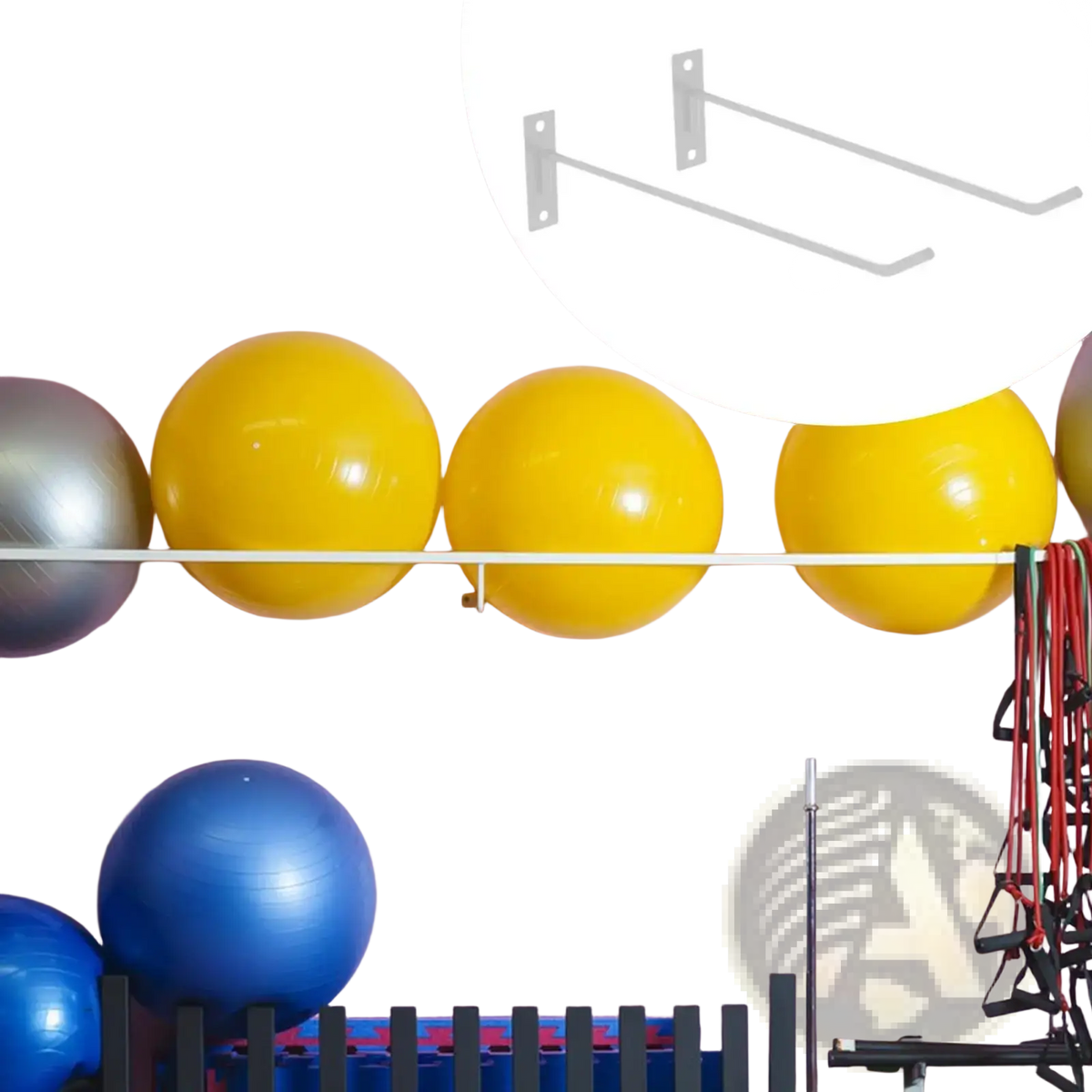 Silver metal wall-mounted iron storage rack designed for holding exercise balls securely and efficiently