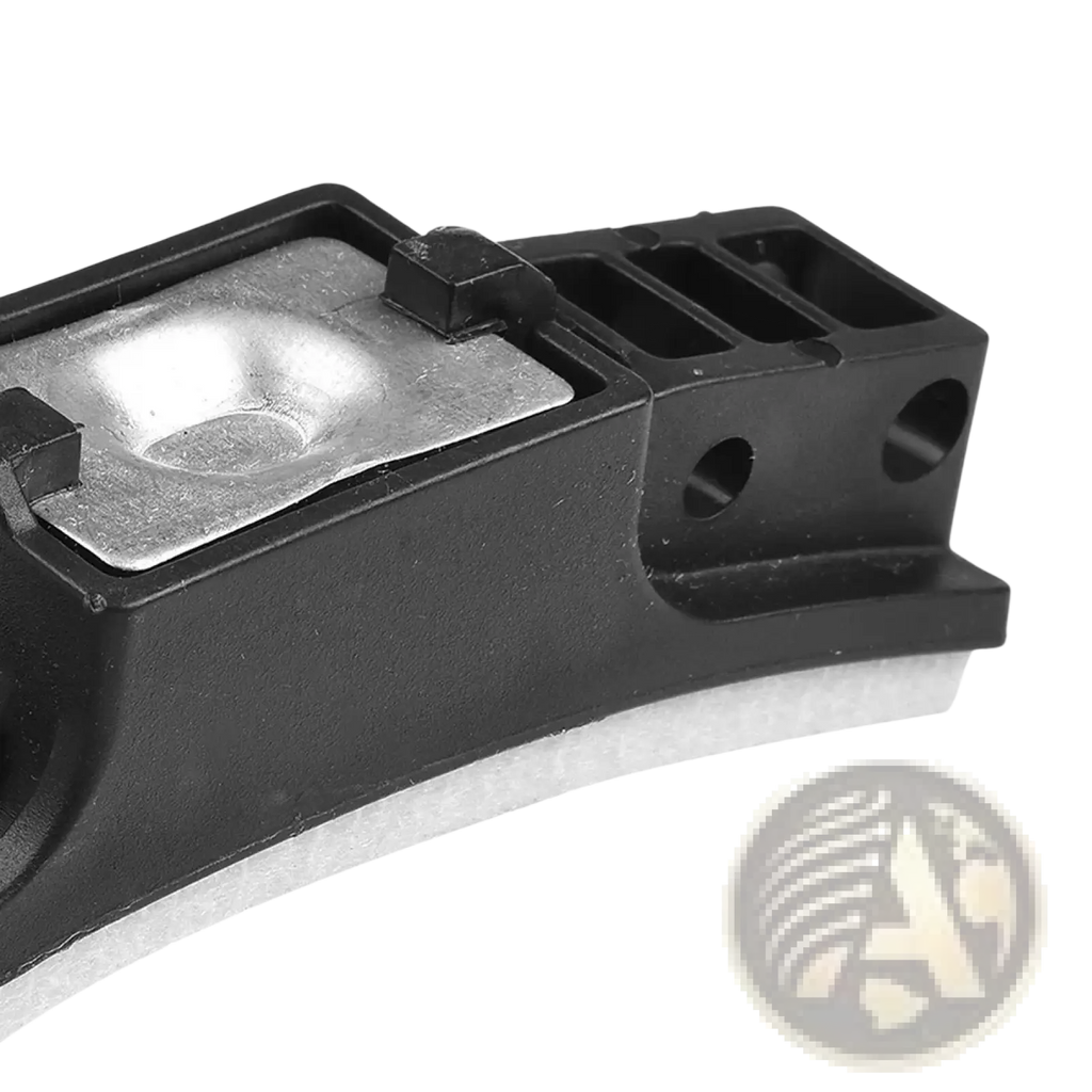 Black plastic exercise bike brake pad replacement latch with silver metal plate and circular cutouts visible on back side