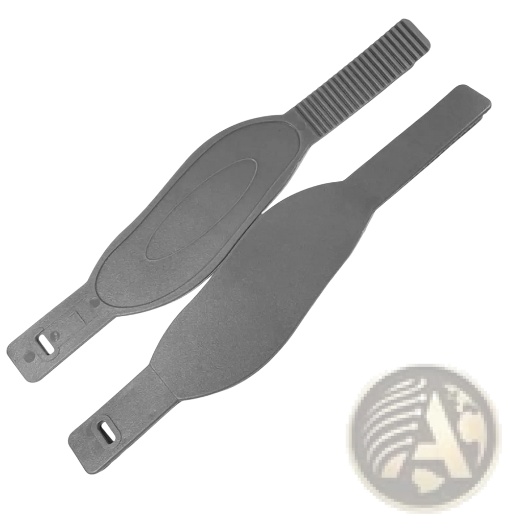 Gray plastic exercise bike pedal strap with textured grip and molded oval design adjustable replacement part