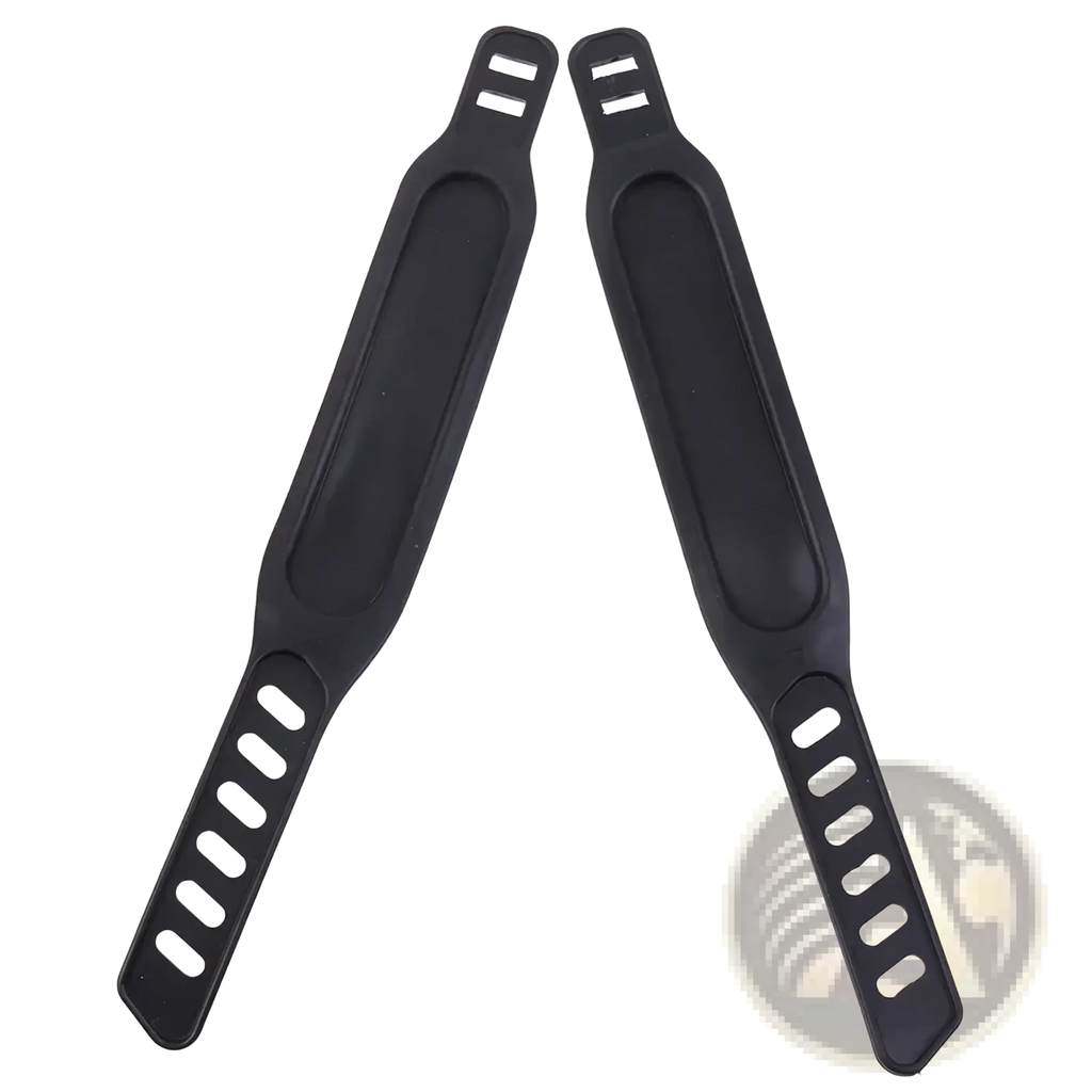 Black silicone exercise bike pedal straps pair with matte finish and contoured design featuring oval cutouts