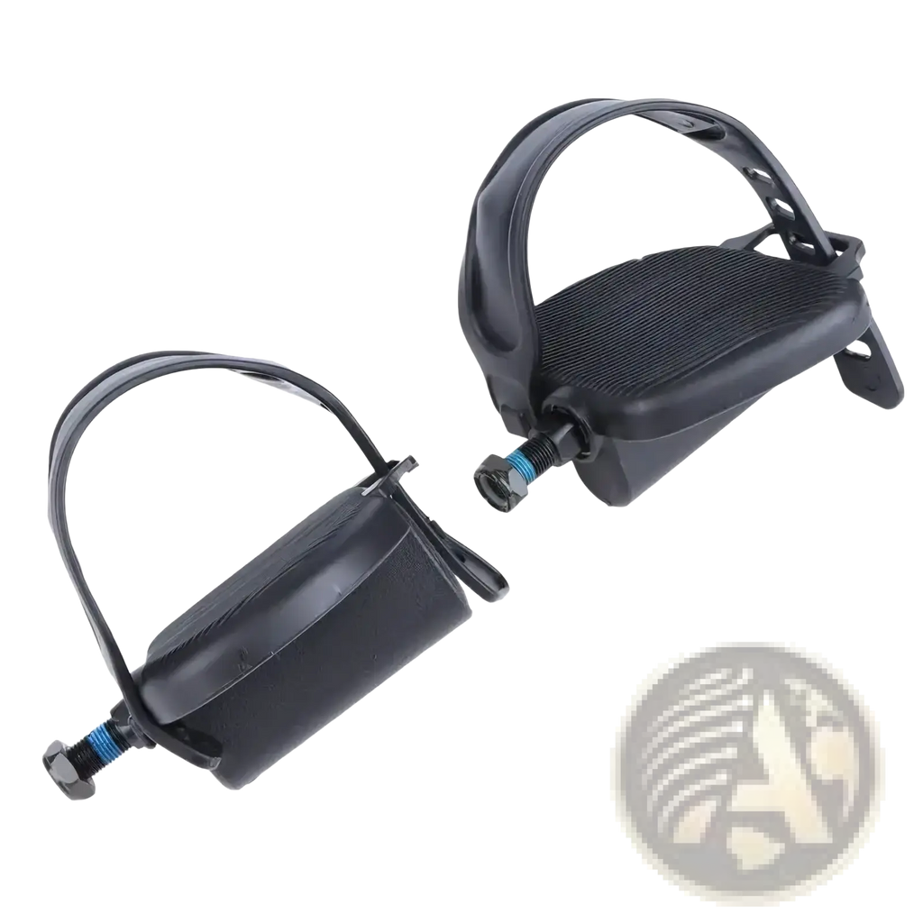 Black plastic exercise bike pedal with textured footbed and adjustable anti slip strap shown from the back side