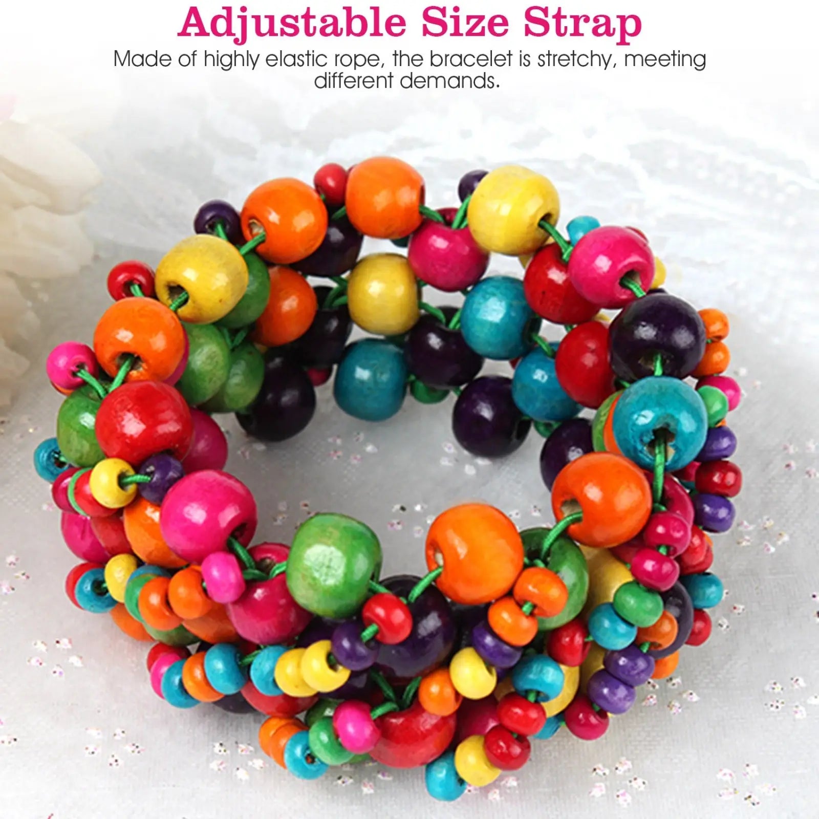 Exotic multicolored wooden beaded stretch bracelet with vibrant orange pink teal green and purple beads on elastic rope
