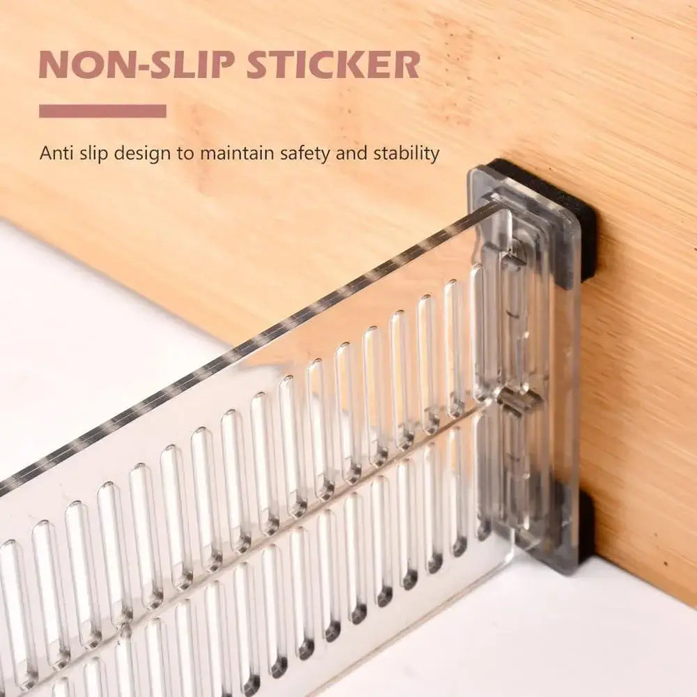 Clear plastic non-slip sticker with black rubber backing for expandable clear plastic drawer dividers securing items in place