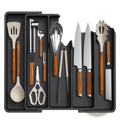 Black silicone expandable kitchen silverware drawer organizer tray with wooden handles and stainless steel blades