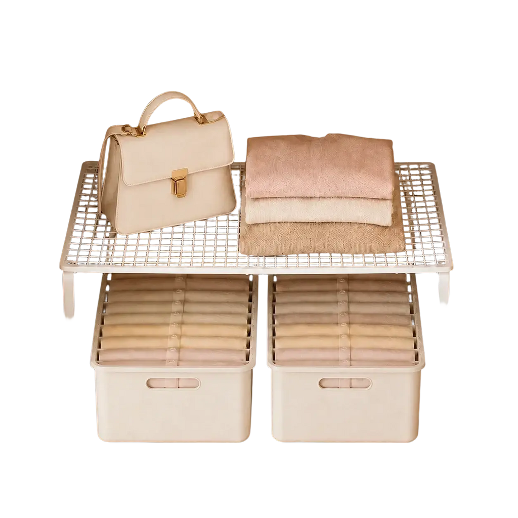 Cream-colored handbag with gold-tone clasp and handles on expandable metal closet shelf white mesh organizer