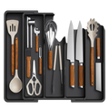Black silicone expandable silverware drawer organizer with wooden handled tools and stainless steel blades