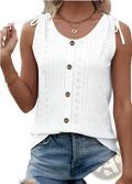 White eyelet button front tank top with adjustable tie straps and brown buttons down the front