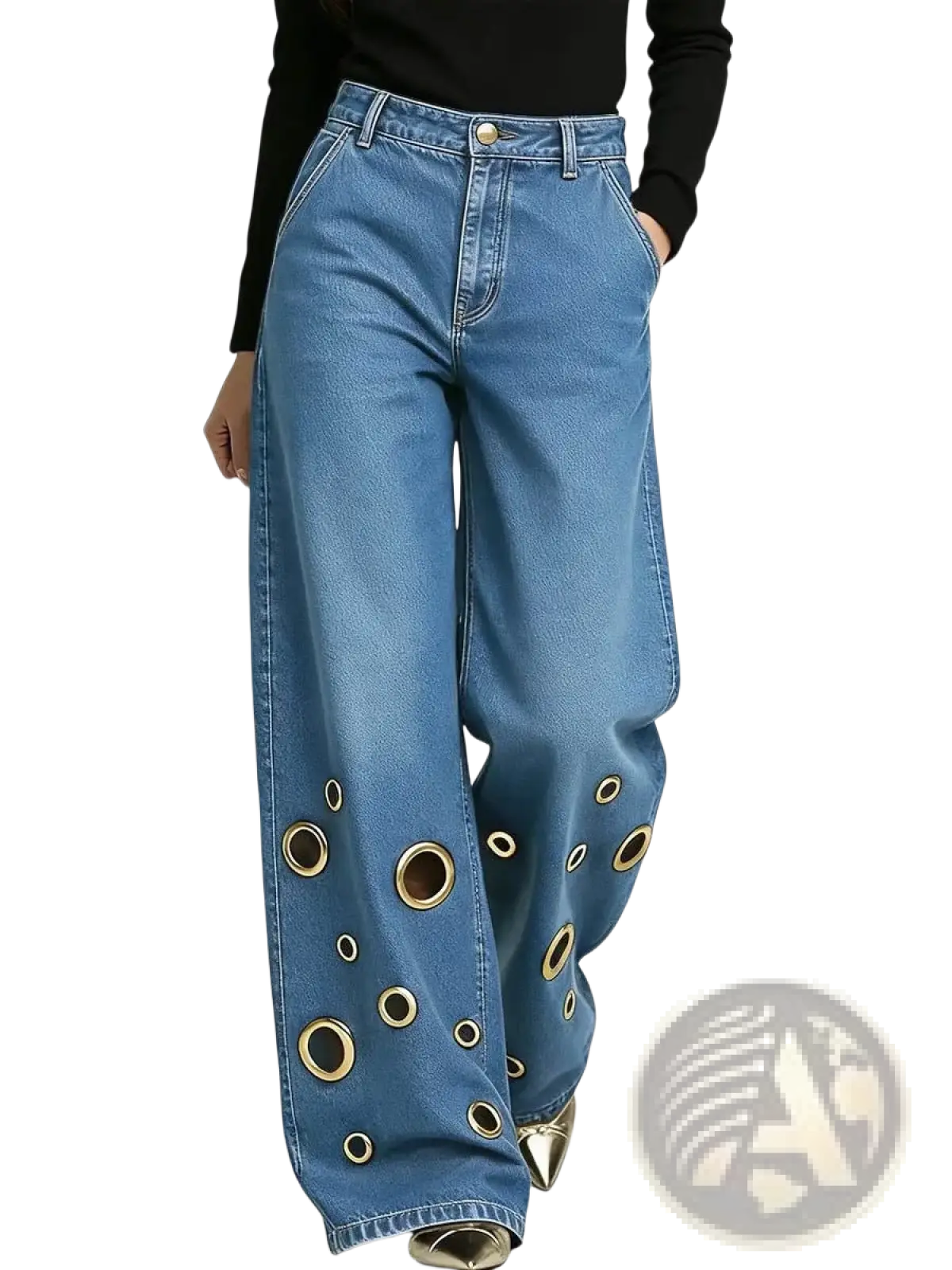 Blue denim wide leg jeans featuring gold toned circular eyelets along the lower legs for a trendy look