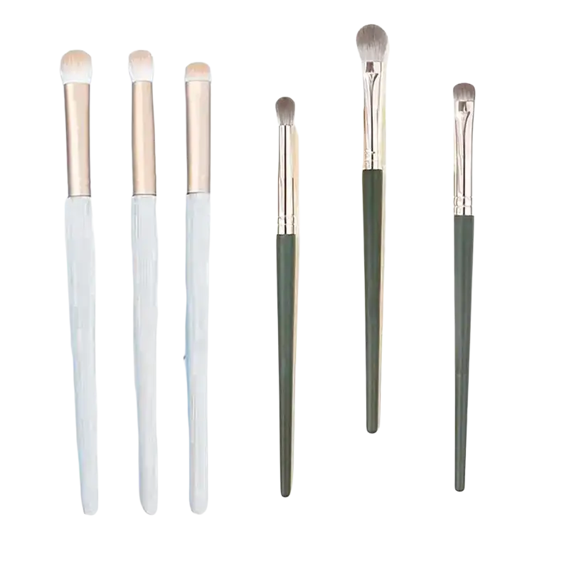 Set of six elegant eyeshadow makeup brushes with sleek metallic handles and soft tapered bristles for professional use