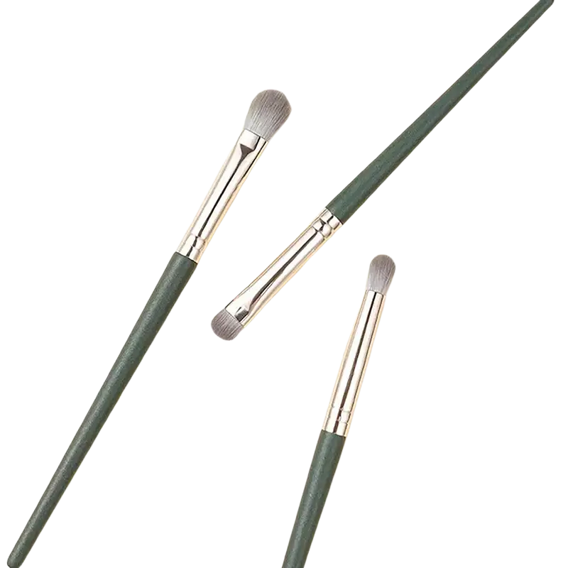 Three elegant dark green-handled eyeshadow brush set with silver ferrules and soft gray bristles for professional makeup