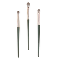 Three elegant eyeshadow brushes with dark green handles silver ferrules and soft gray bristles for professional makeup use
