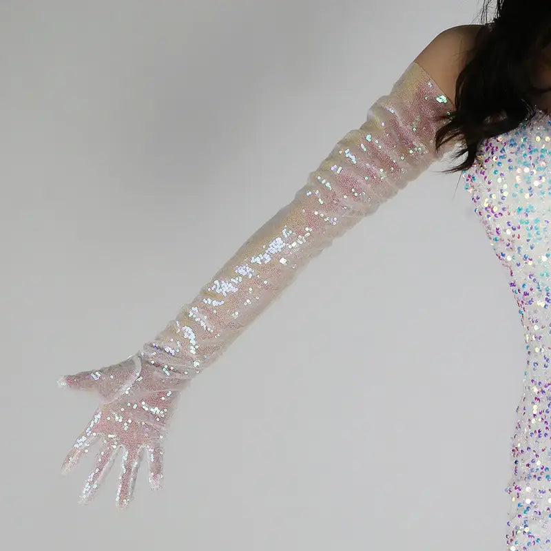Sequined mesh finger gloves set featuring long iridescent sequined gloves with a sheer mesh base and shimmering silver and pink glitter accents.