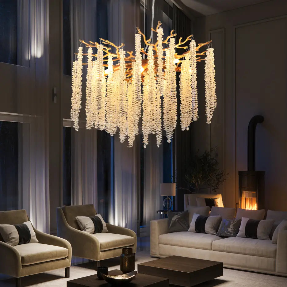 A 24 inch gold crystal waterfall pendant light featuring a golden branch-like chandelier design with cascading strands of clear crystal beads.