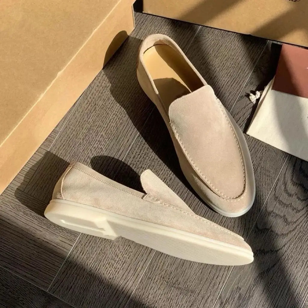 Men’s suede summer loafers in beige with a clean minimalist design and white rubber soles for casual slip-on wear.