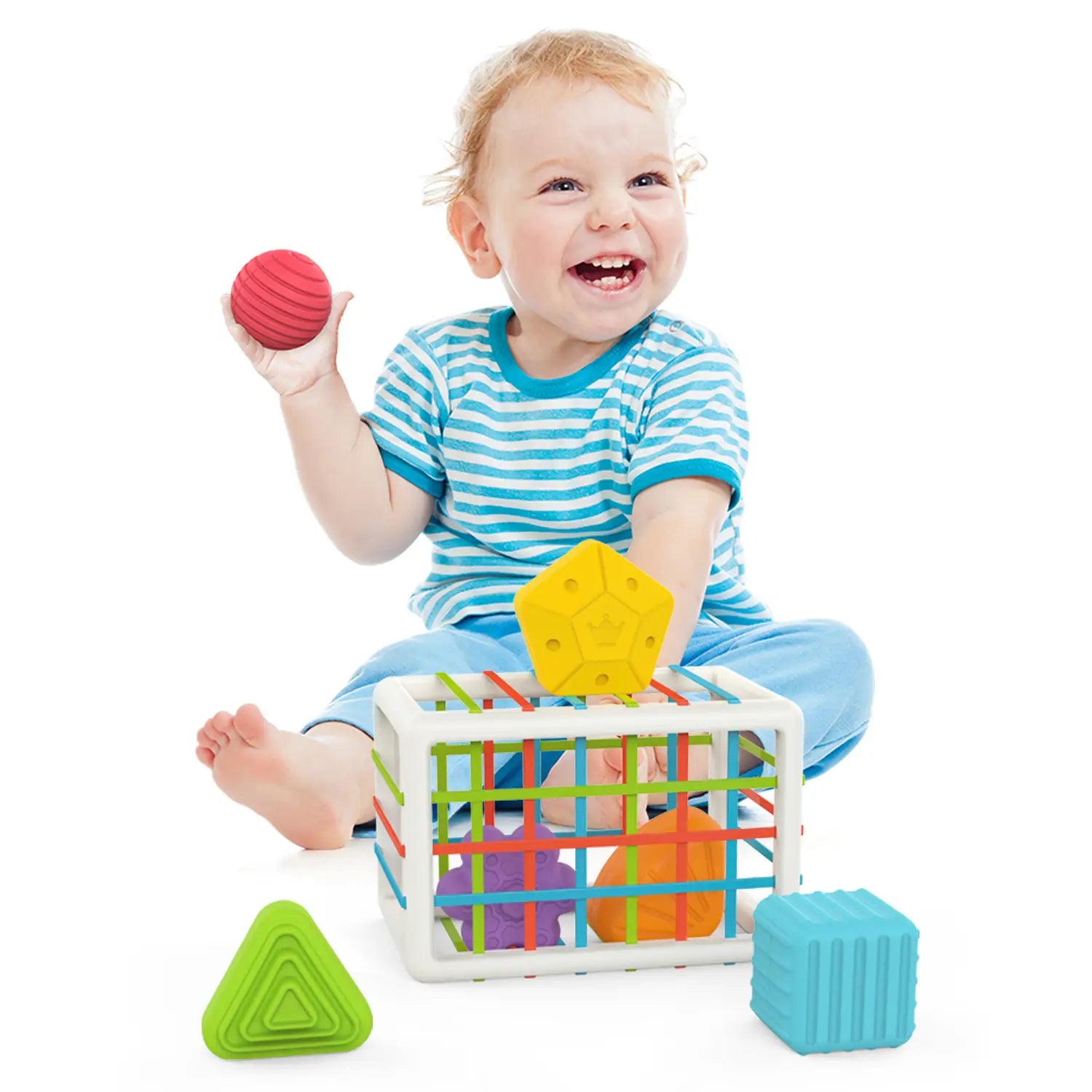 Jouet trieur de formes Montessori pour jeux sensoriels de bébé, comprenant des formes géométriques en silicone brillamment colorées et une boîte à jouets quadrillée blanche avec des barres colorées.
