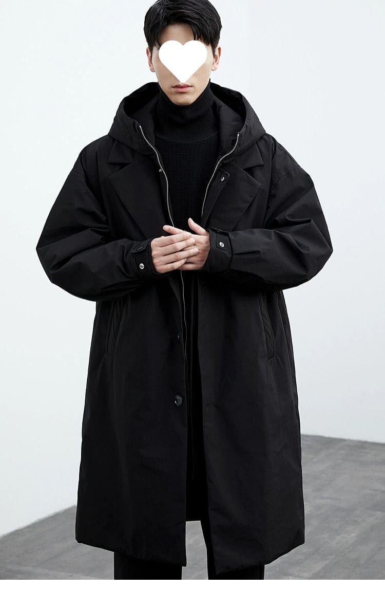 Men hooded trench coat in black featuring a sleek modern design with subtle zipper detailing for winter use.