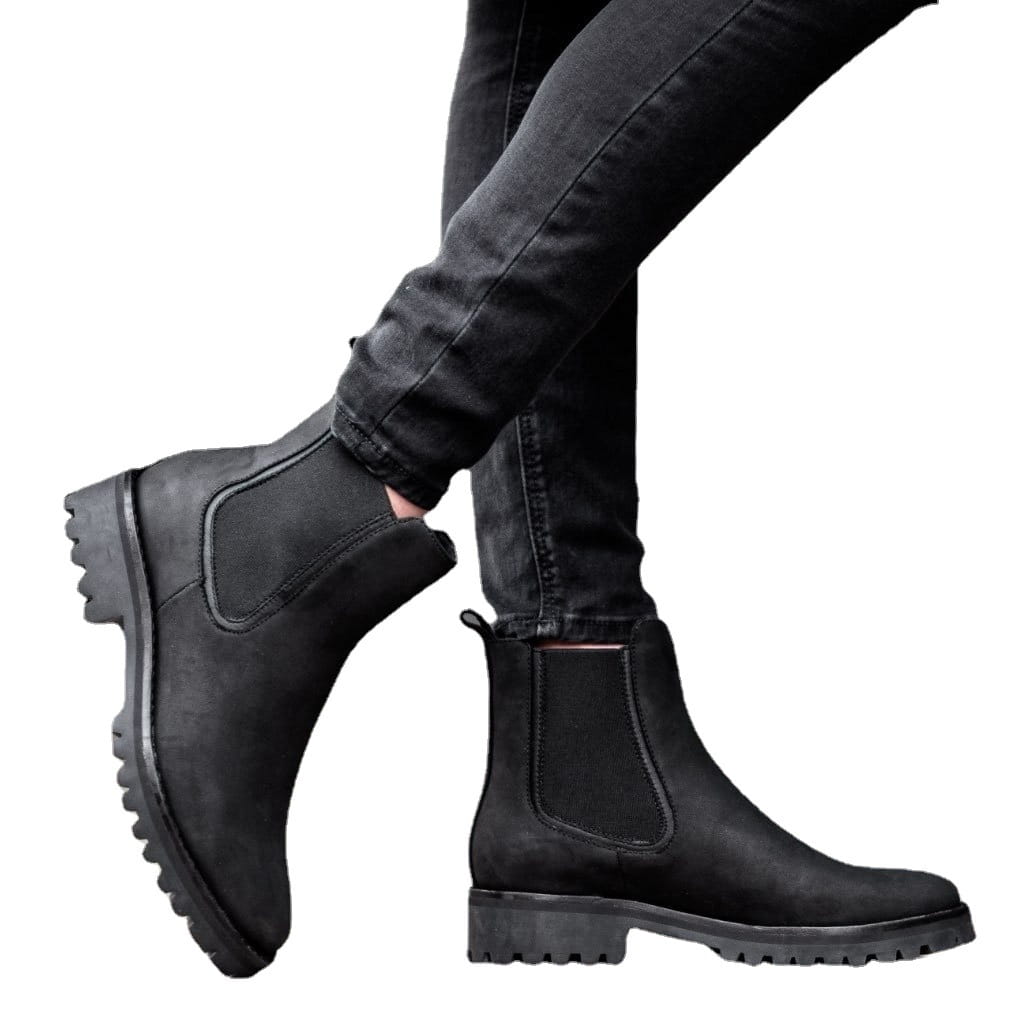 black suede chelsea boots featuring a chunky textured rubber sole contrasting the brown suede chelsea boots with chunky platform sole product description