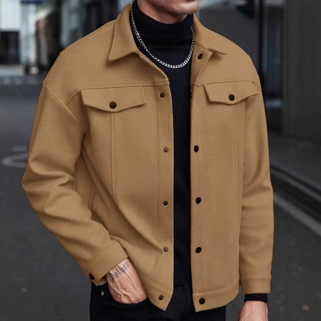 Men’s classic slim fit wool blend lapel jacket in tan wool with two chest pockets and dark brown buttons.