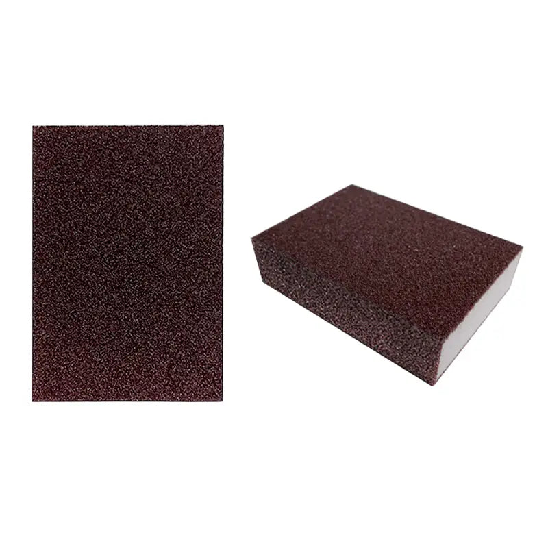 brown abrasive sanding block with textured grainy surface and white backing for nano emery sponge rust and stain remover tool