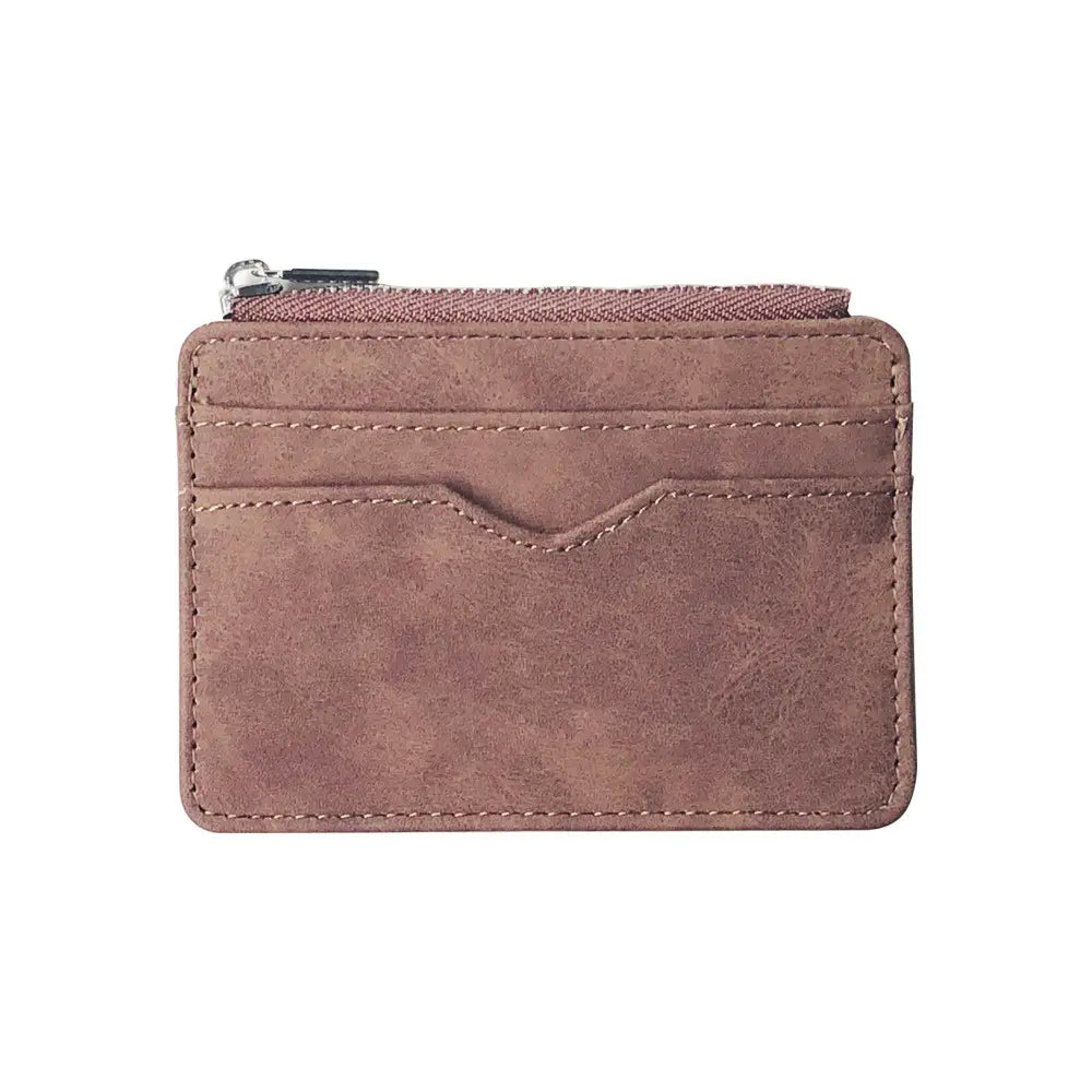 A compact dusty rose pu leather zippered card holder wallet for men with textured faux leather material and stitched detailing.