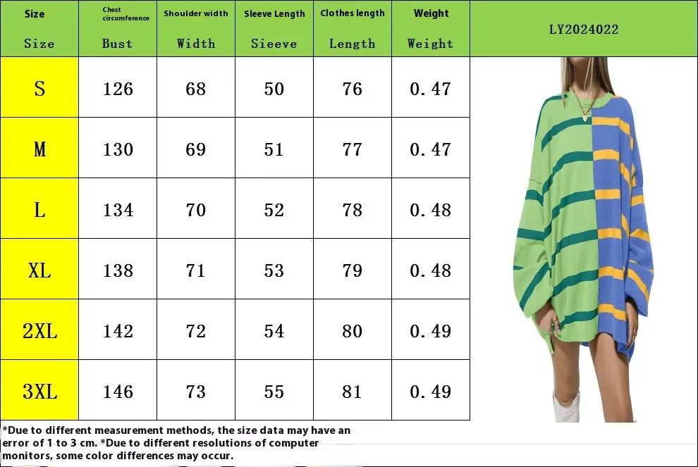 A vibrant oversized knit sweater dress for women featuring bold horizontal stripes in green blue and yellow with a split color design.